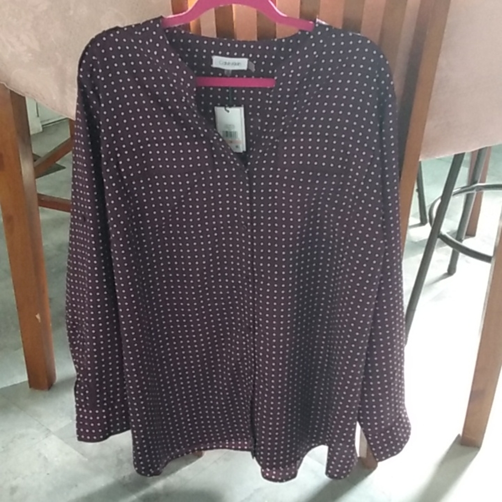 Calvin Klein women's dress shirt made of polyester